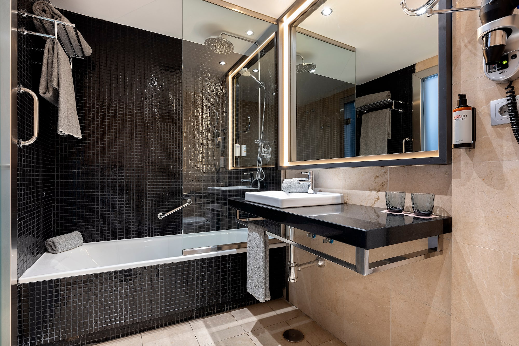 a bathroom with a sink and a bathtub