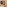 Modern hotel bathroom with backlit mirror, white vanity, and stone tiles.