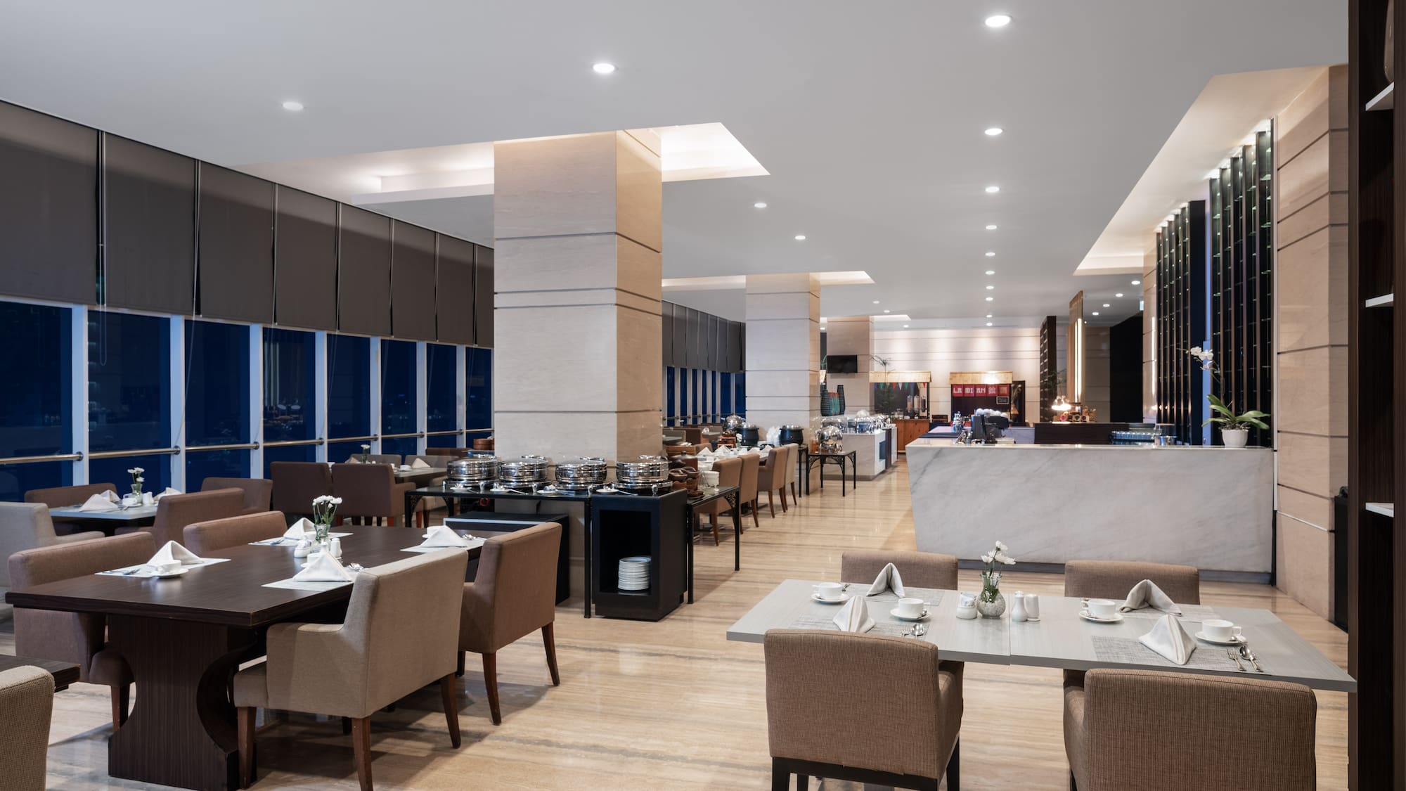 a restaurant with tables and chairs