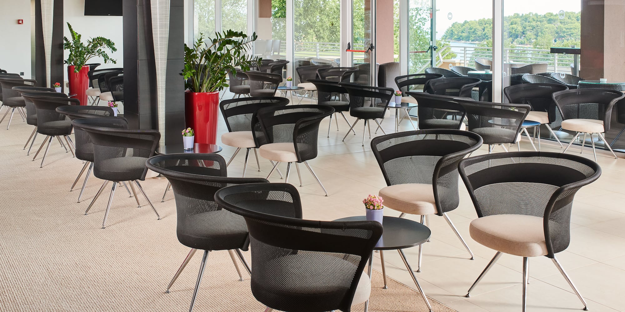 a room with chairs and tables