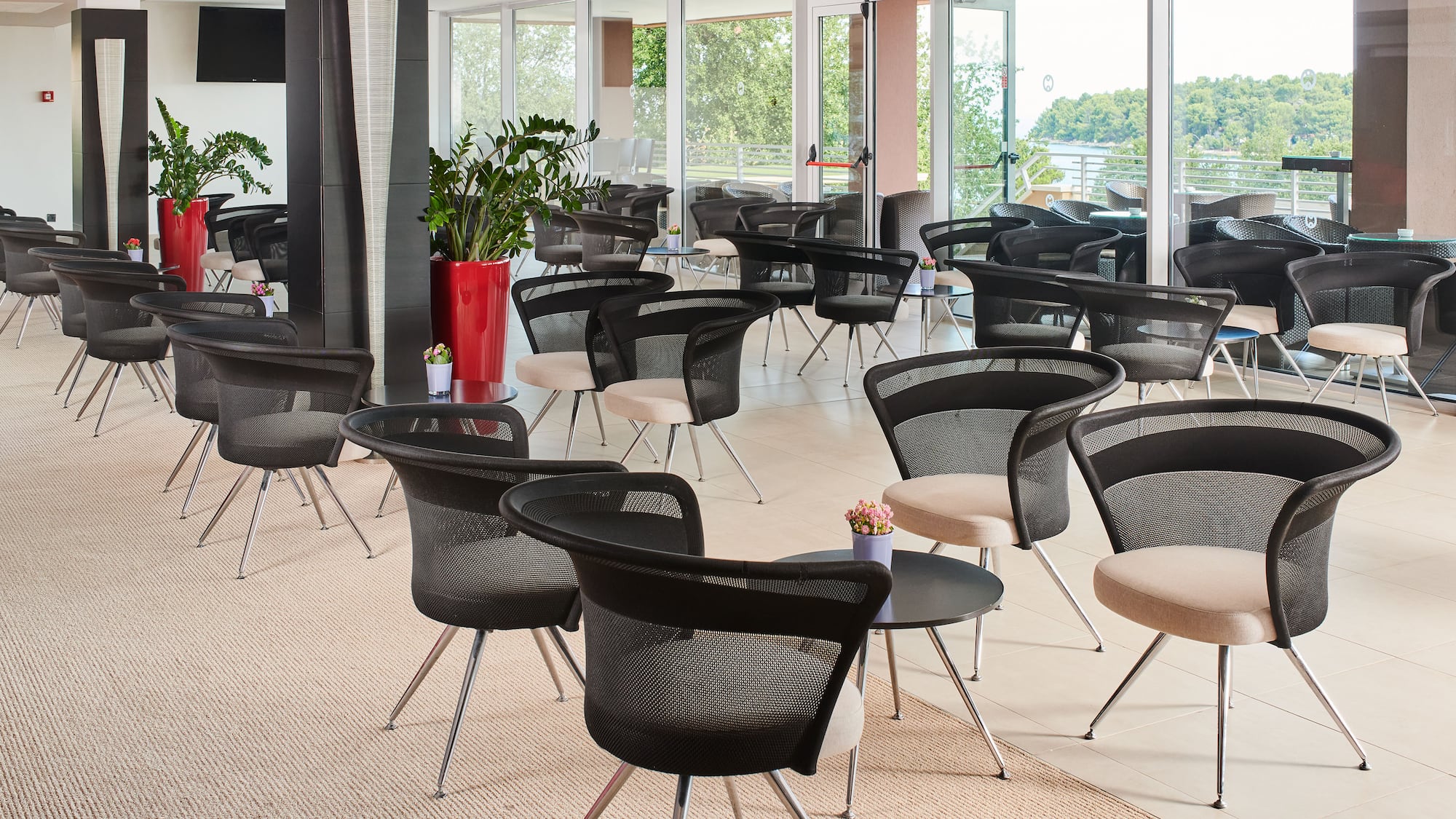 a room with chairs and tables