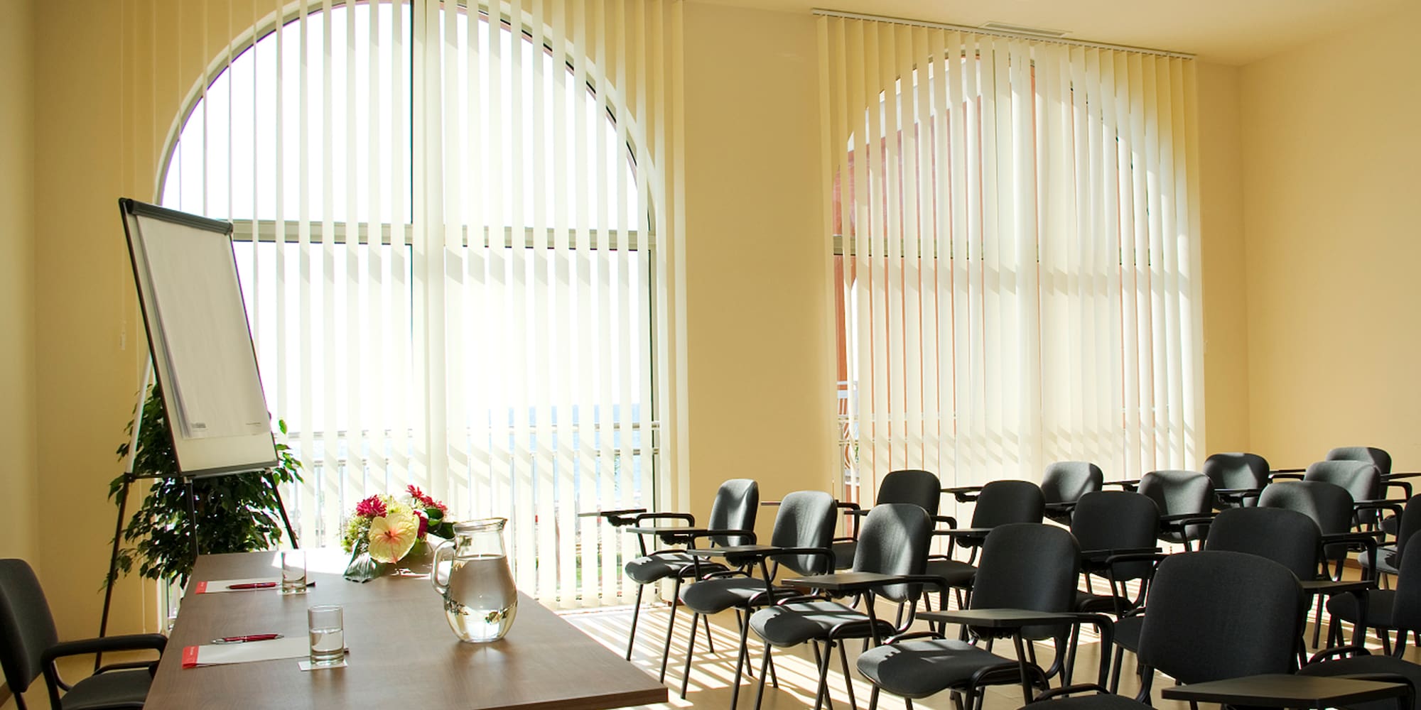 a room with a table and chairs