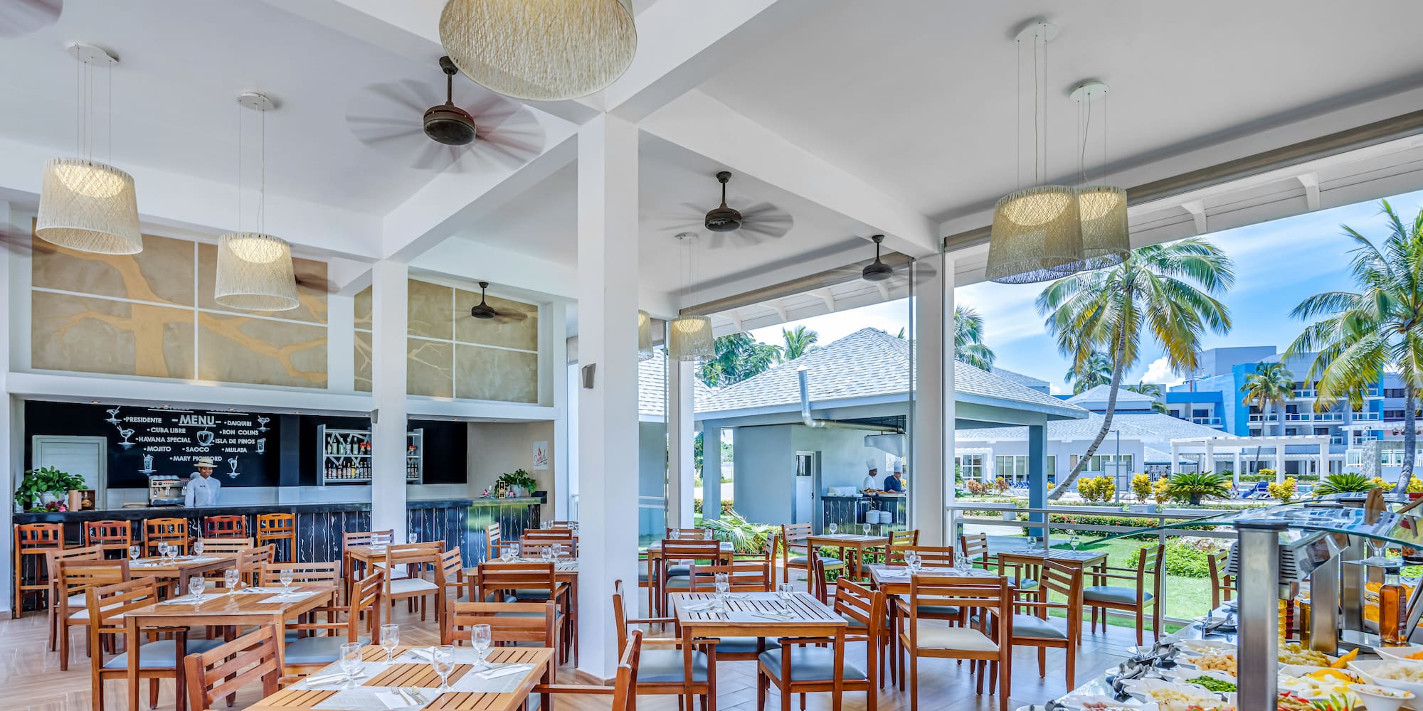 a room with tables and chairs