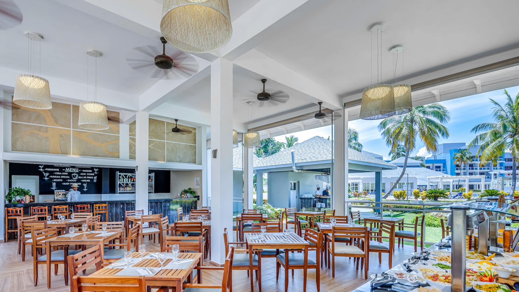 a room with tables and chairs