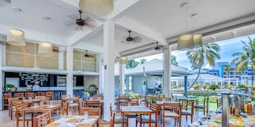 a room with tables and chairs