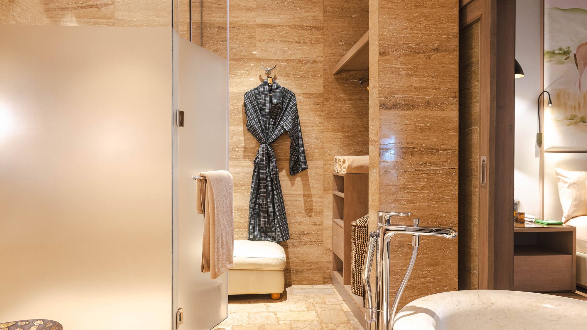 a bathroom with a bathtub and bathtub