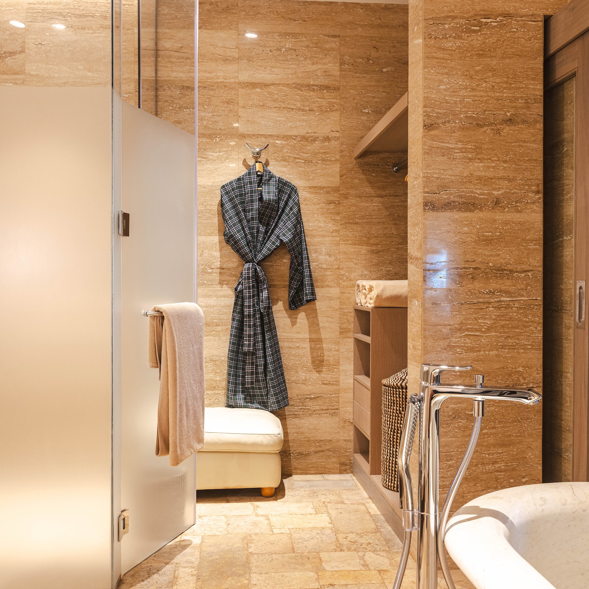 a bathroom with a bathtub and bathtub