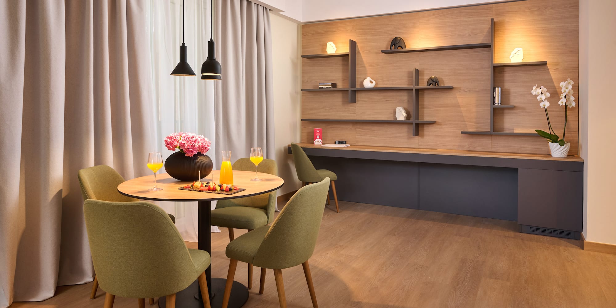 a room with a table and chairs