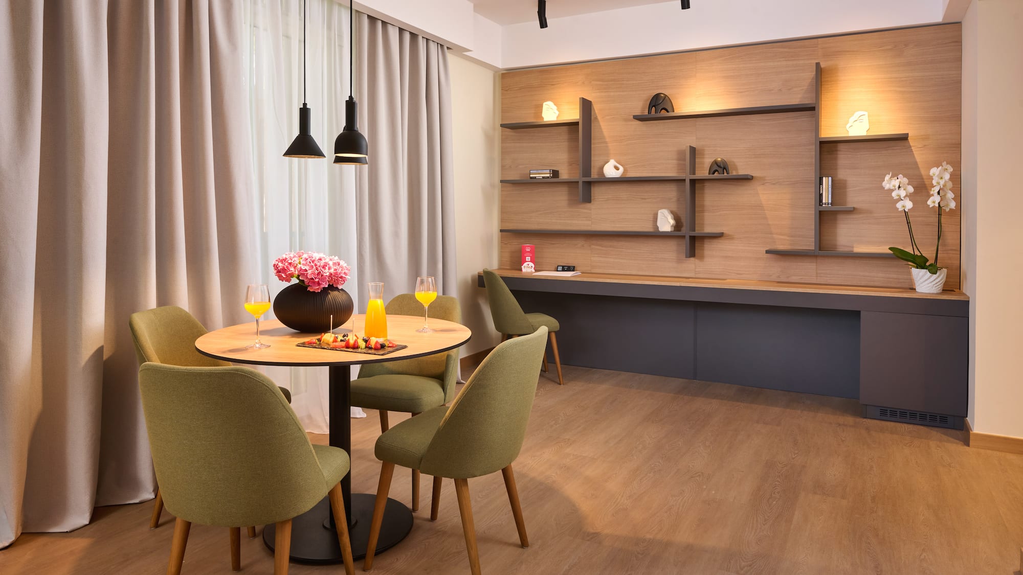 a room with a table and chairs