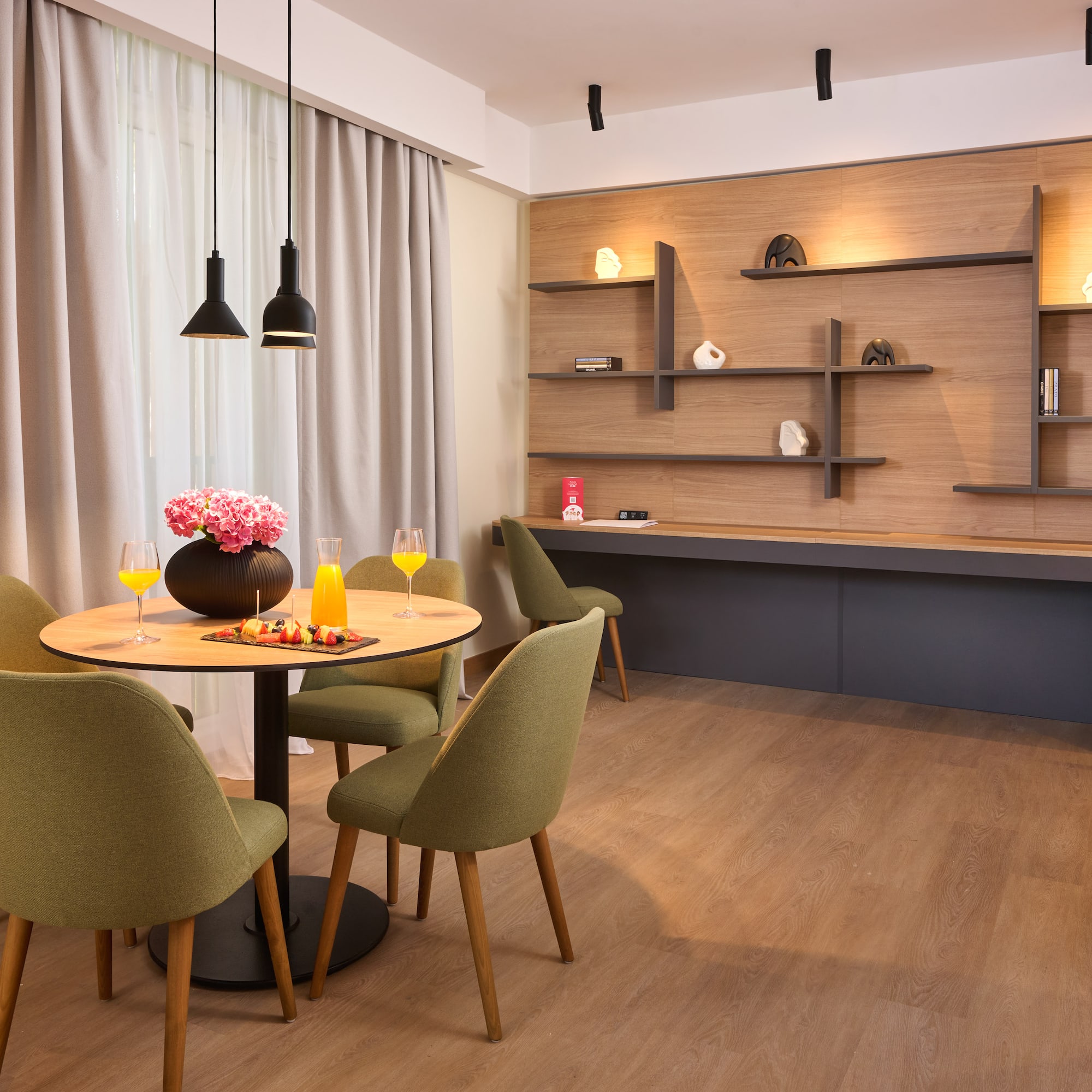 a room with a table and chairs