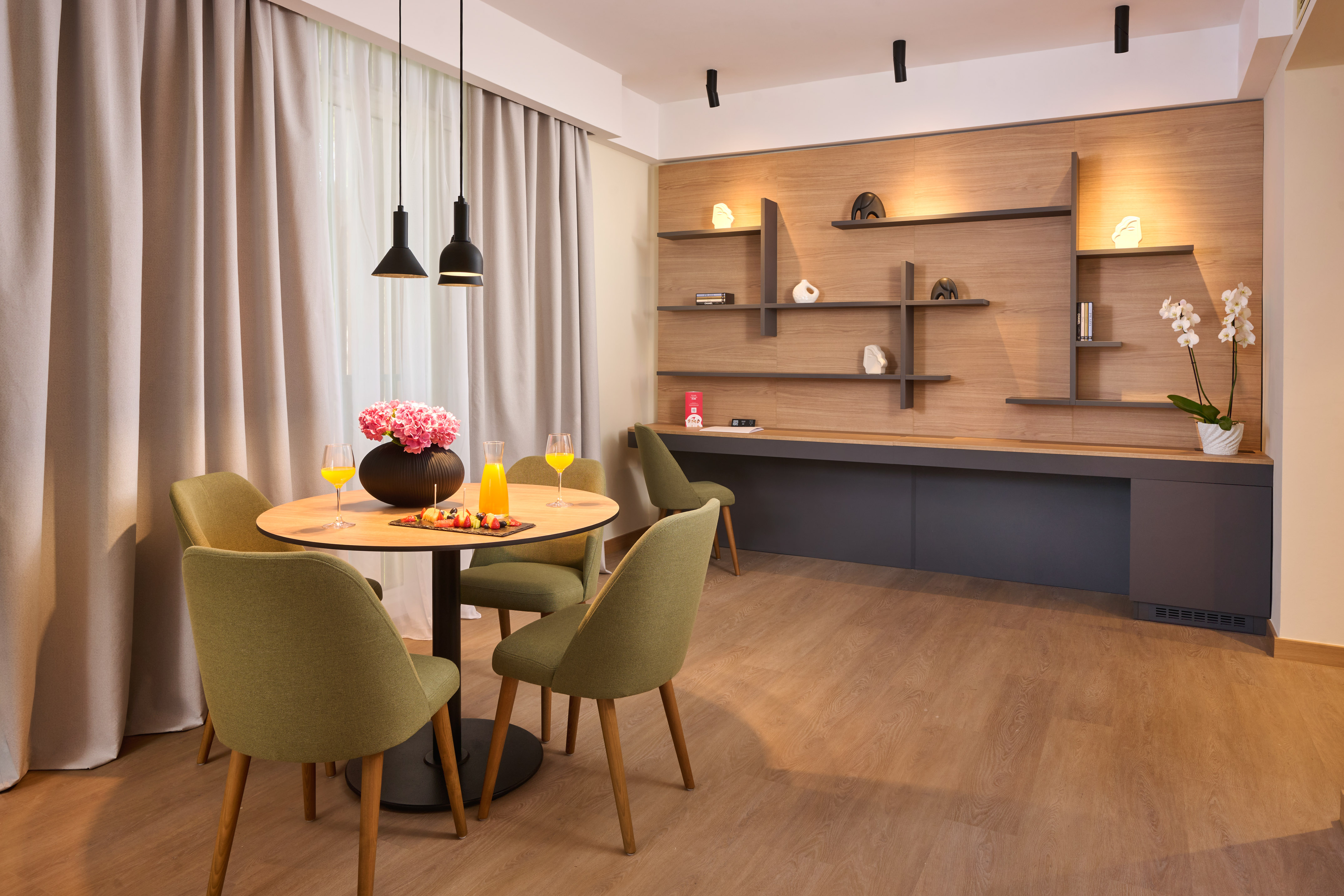 a room with a table and chairs