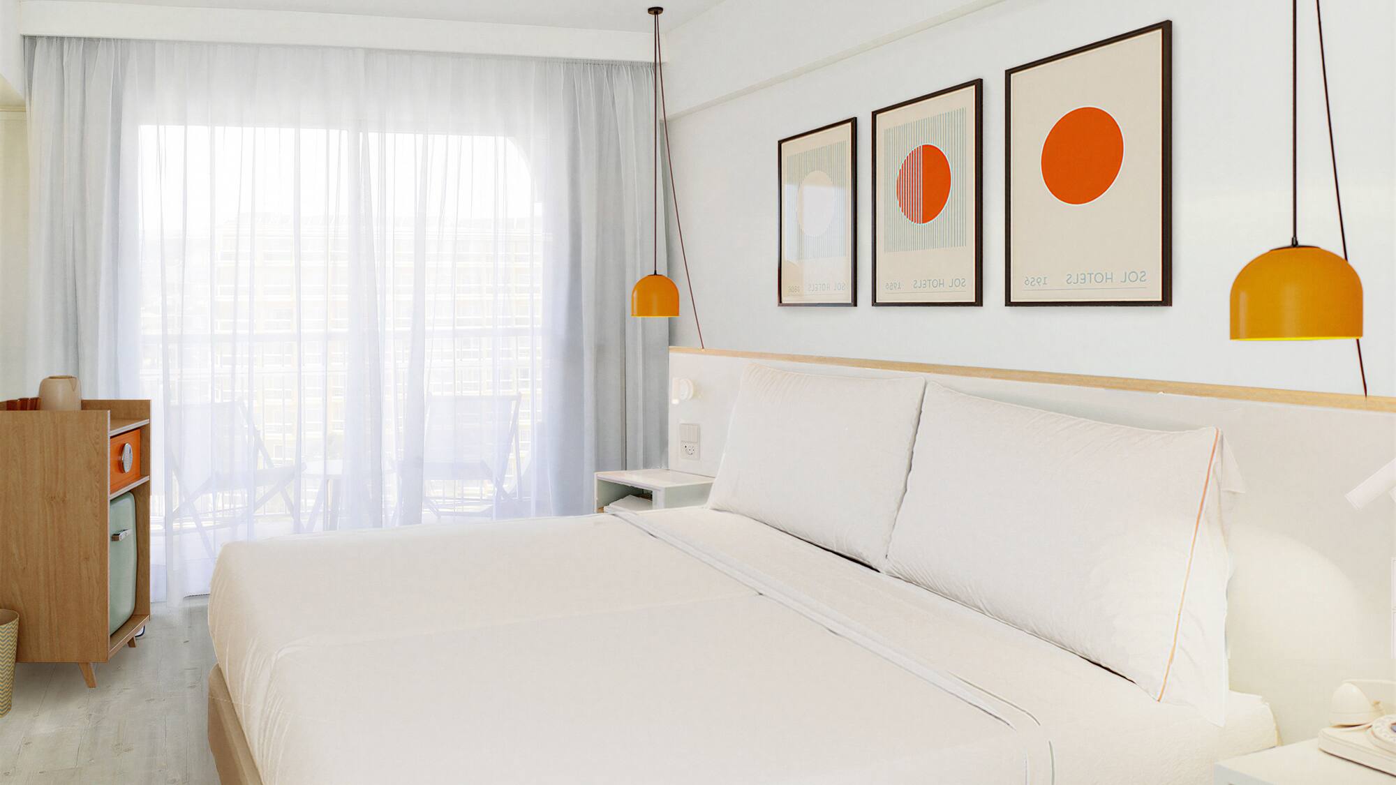 a bed with white sheets and orange art on the wall