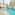 a swimming pool with a fountain in the middle of it