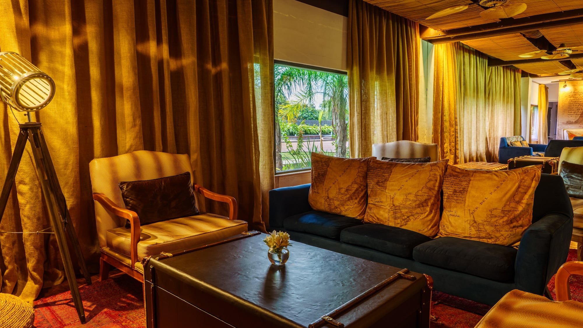 a living room with couches and chairs