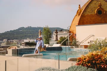a woman standing in a pool
