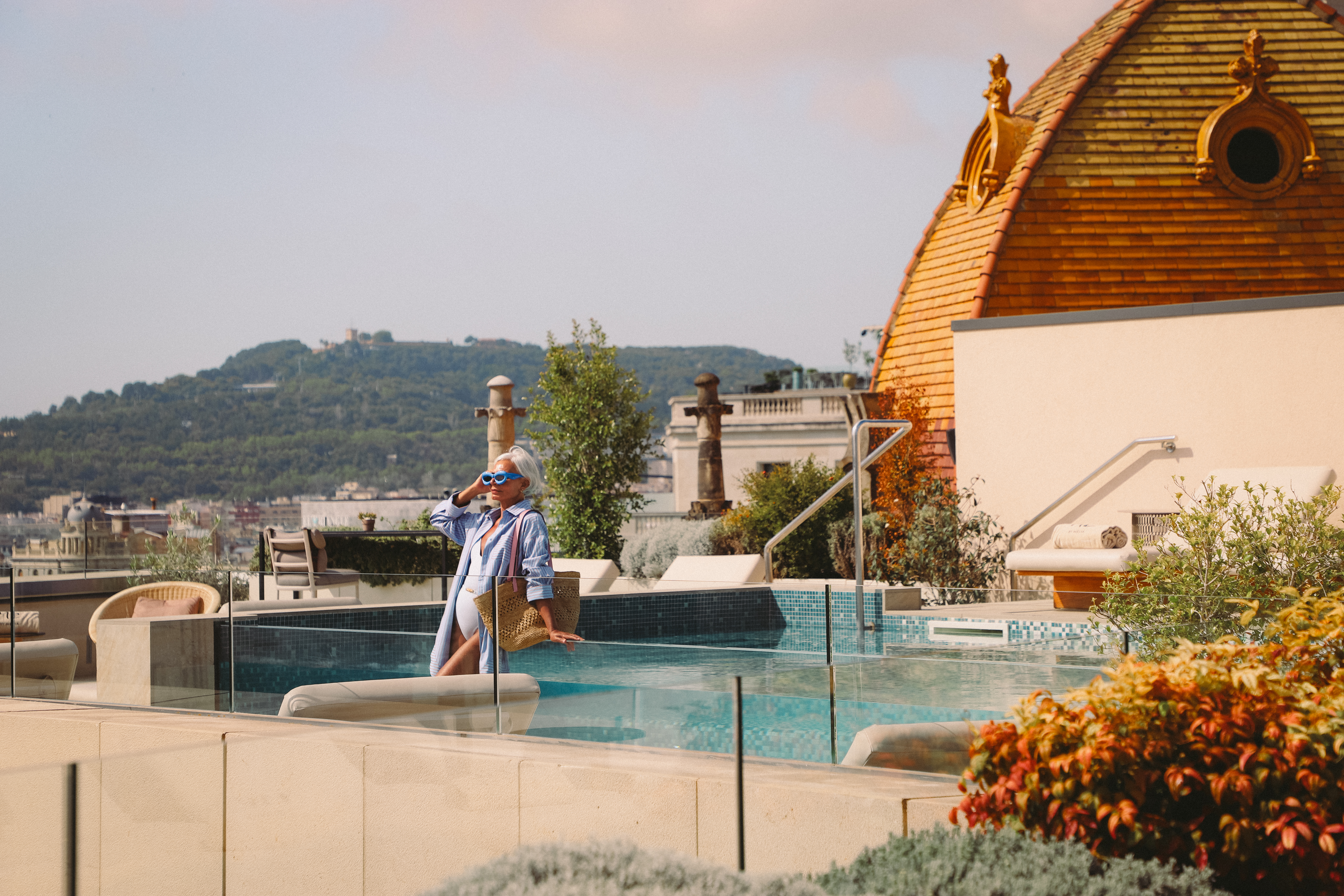 a woman standing in a pool