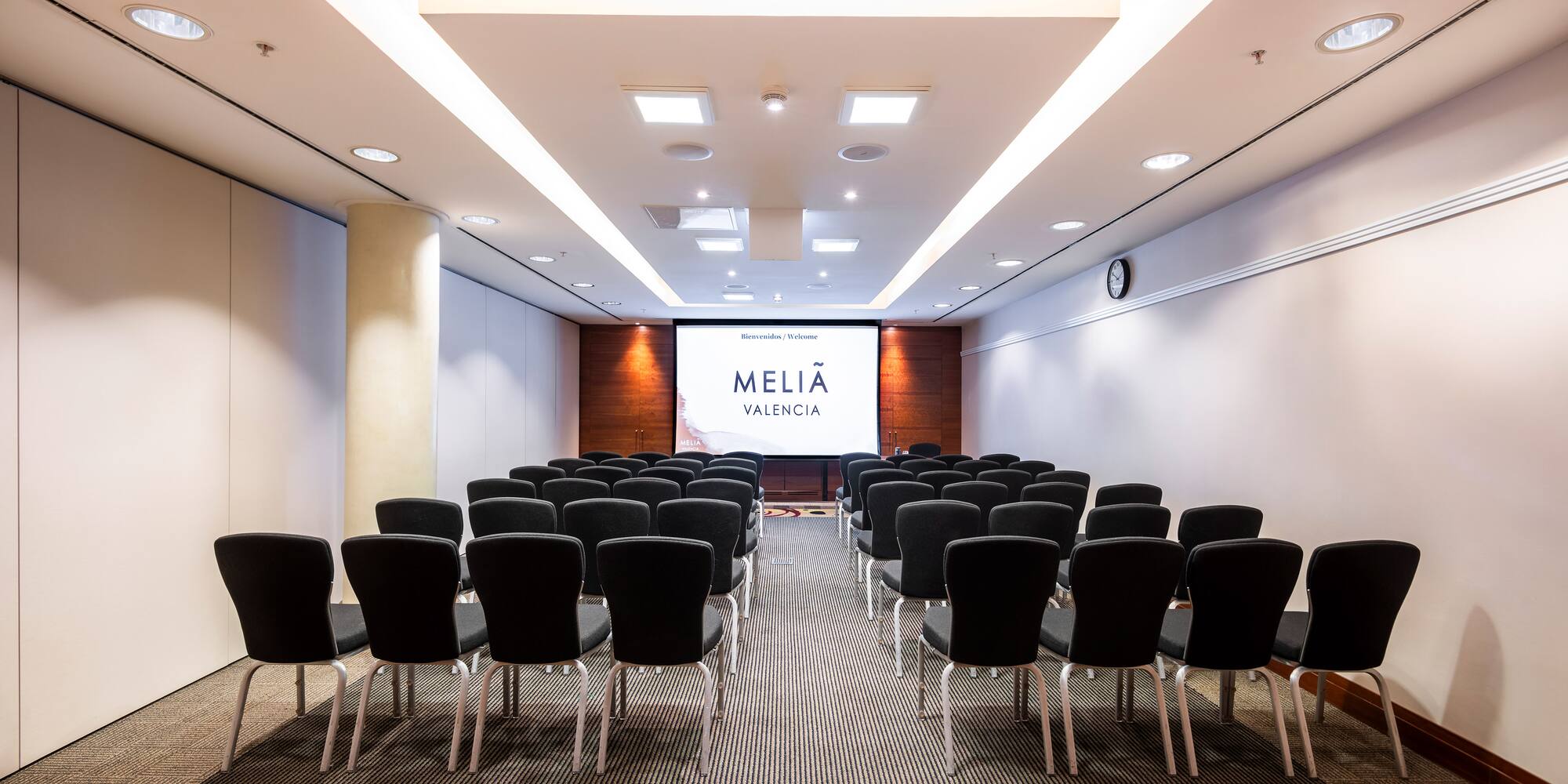 a room with rows of chairs