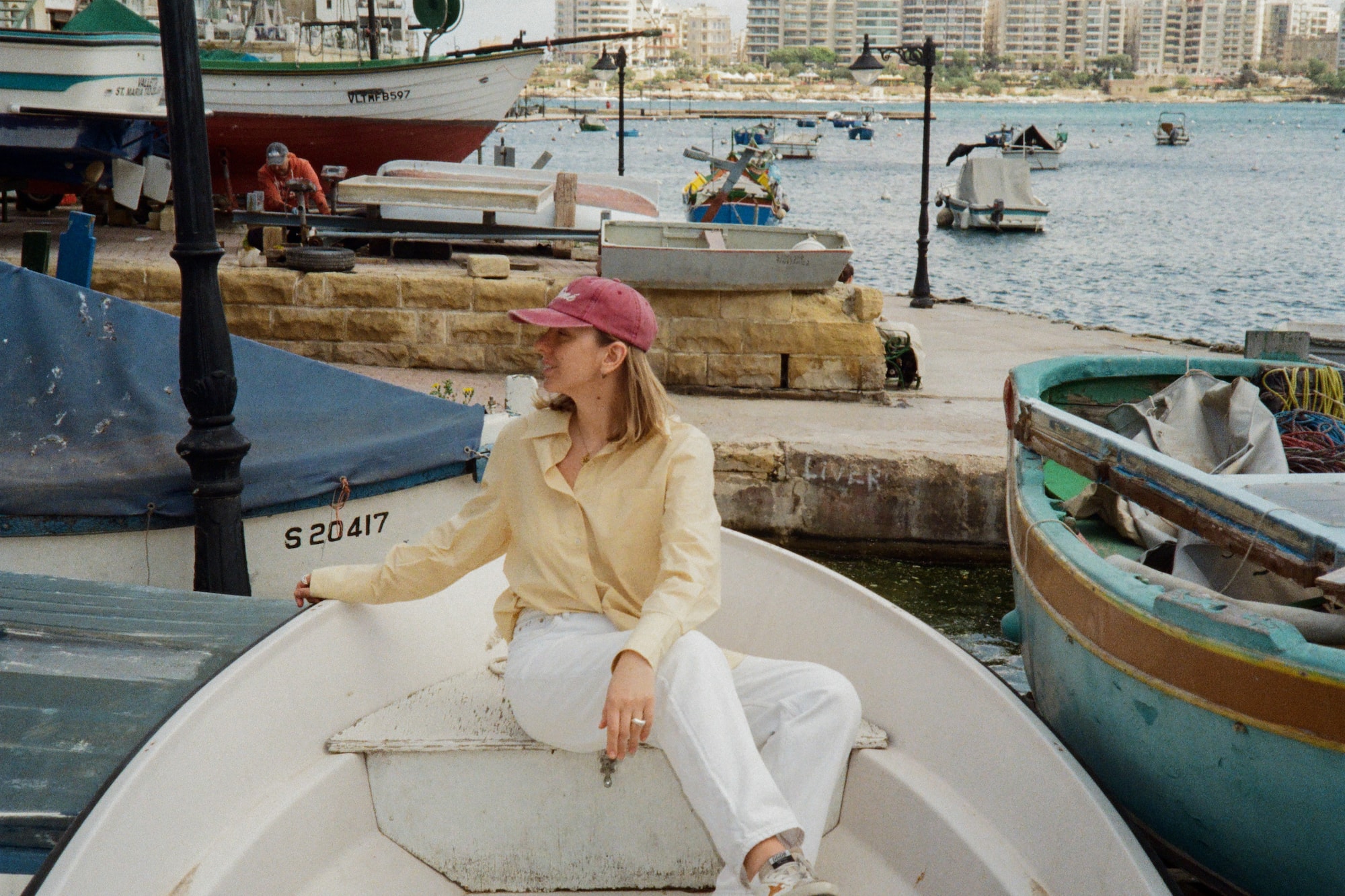 a woman sitting on a boat