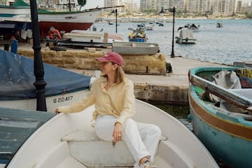 a woman sitting on a boat
