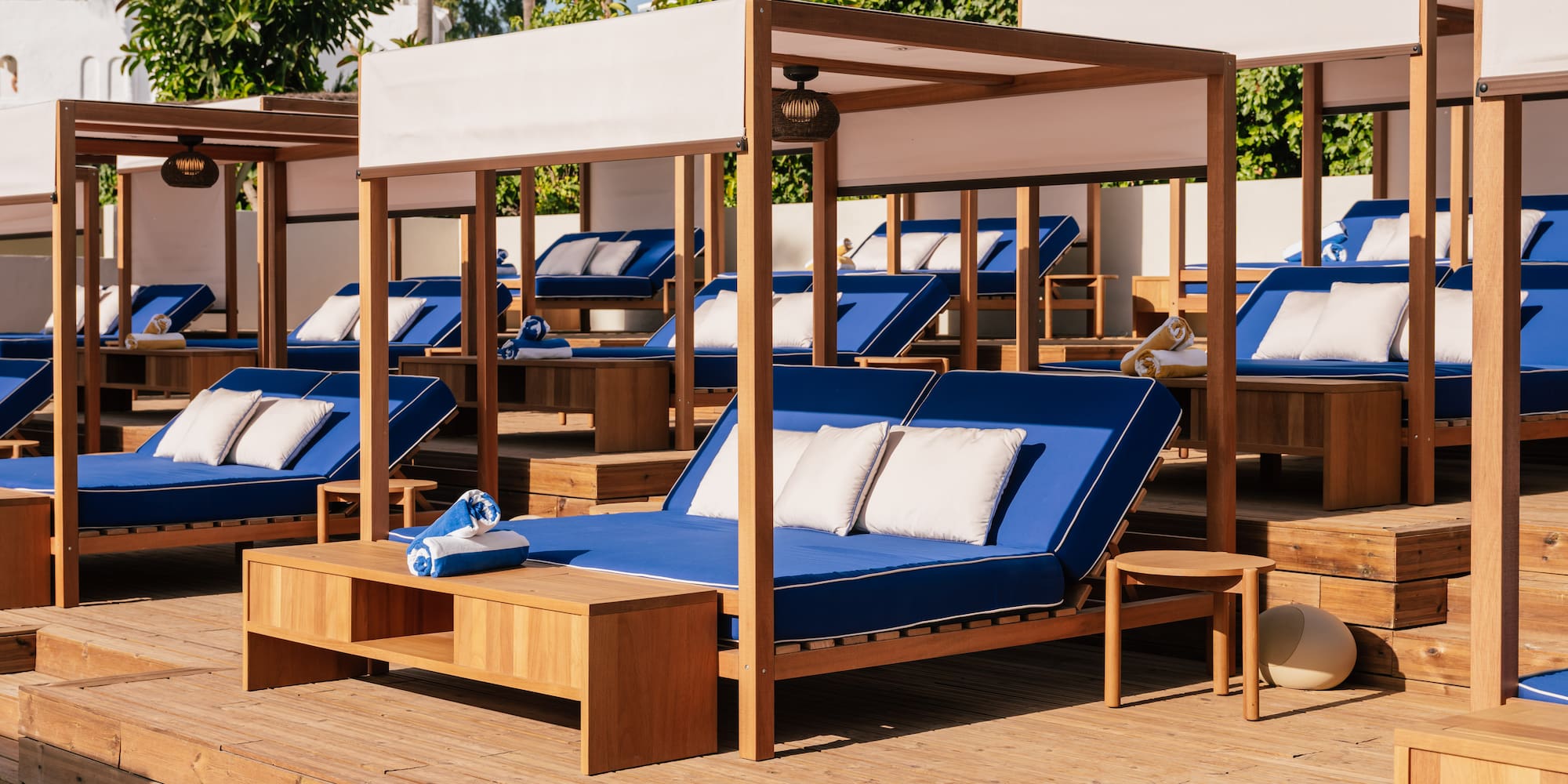 a group of beds on a deck