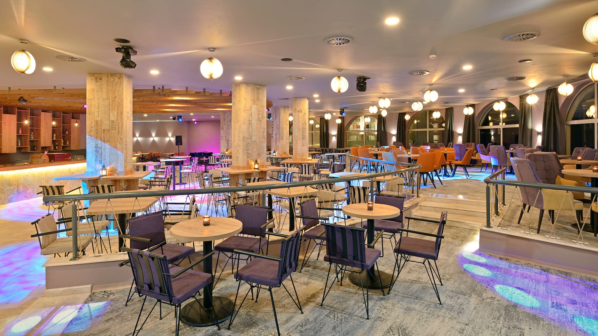 a room with tables and chairs