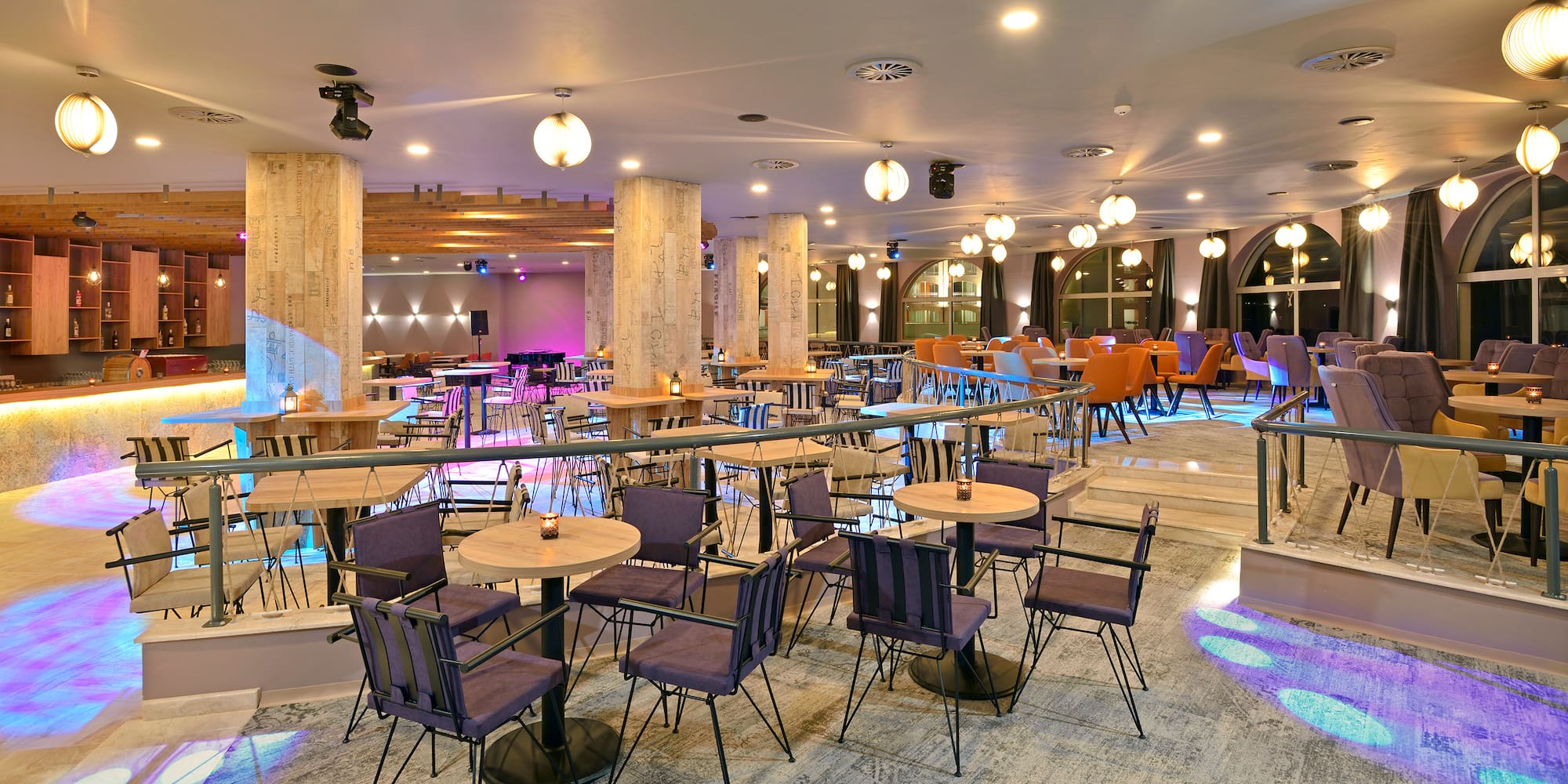 a room with tables and chairs