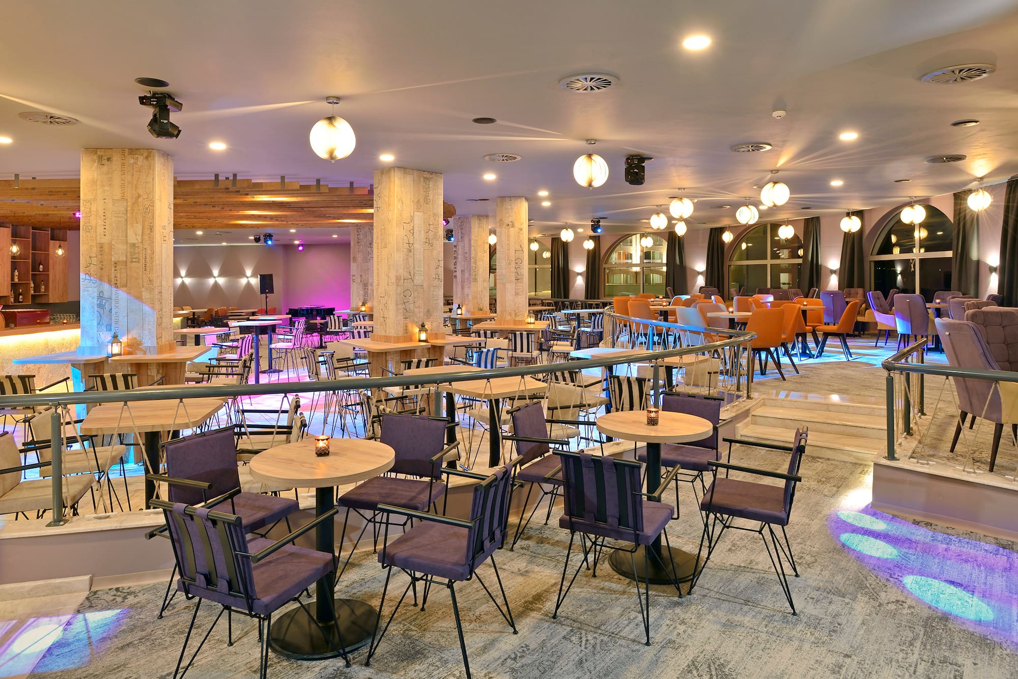 a room with tables and chairs