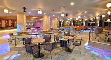 a room with tables and chairs