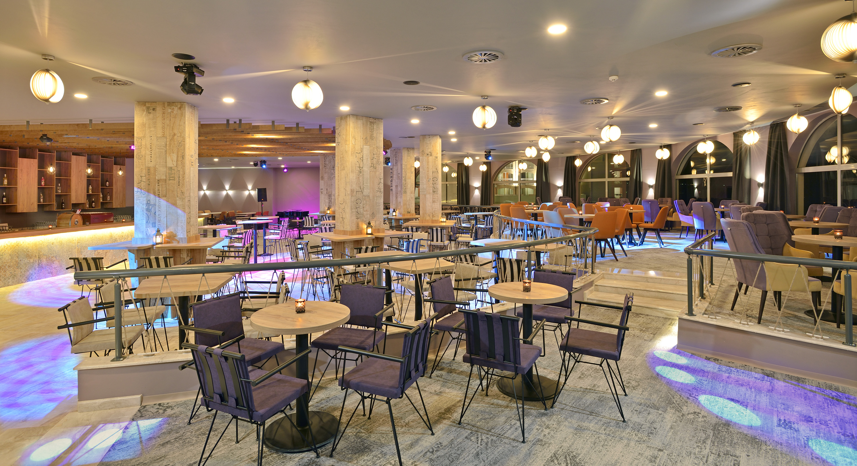 a room with tables and chairs