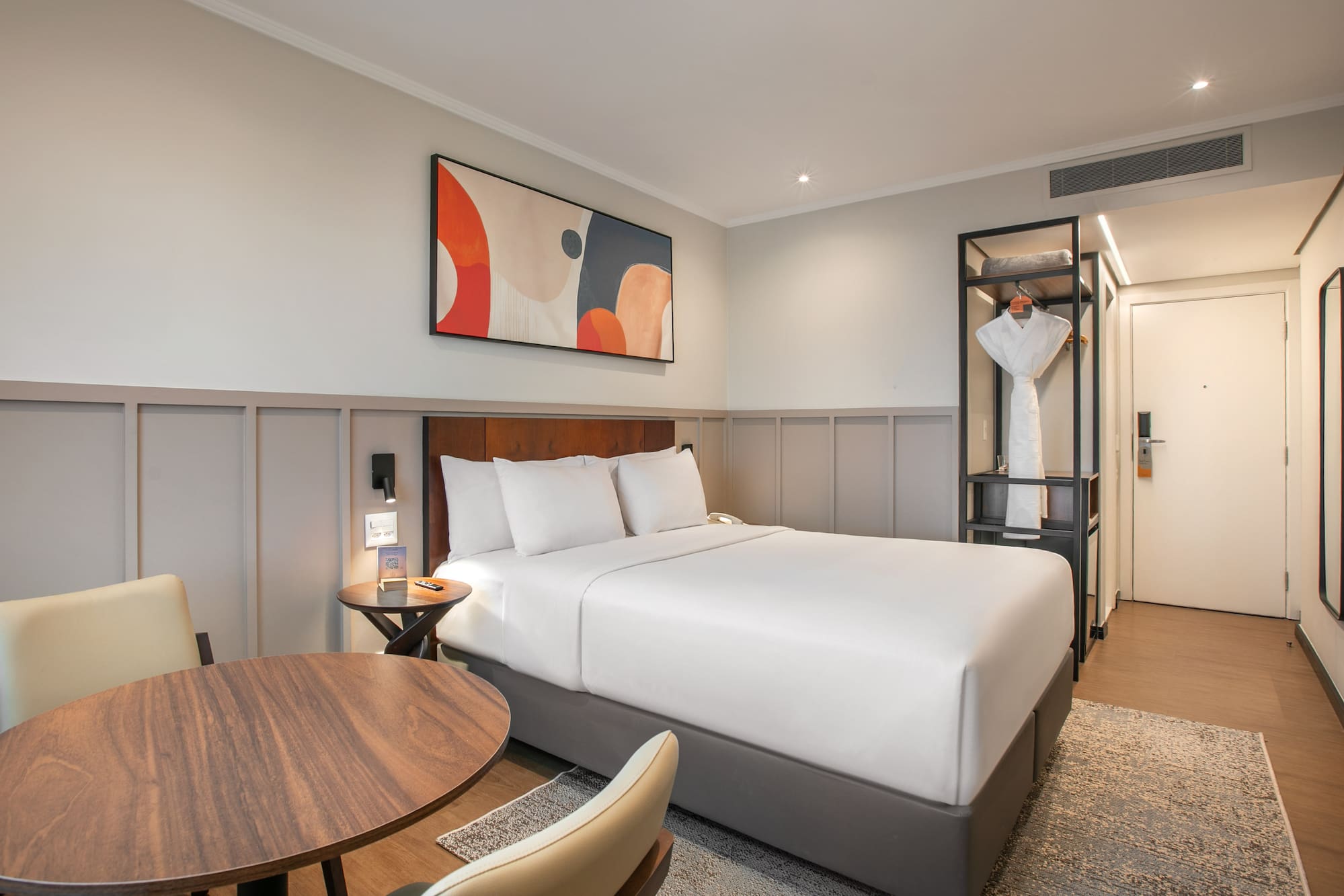 a room with a bed and a table