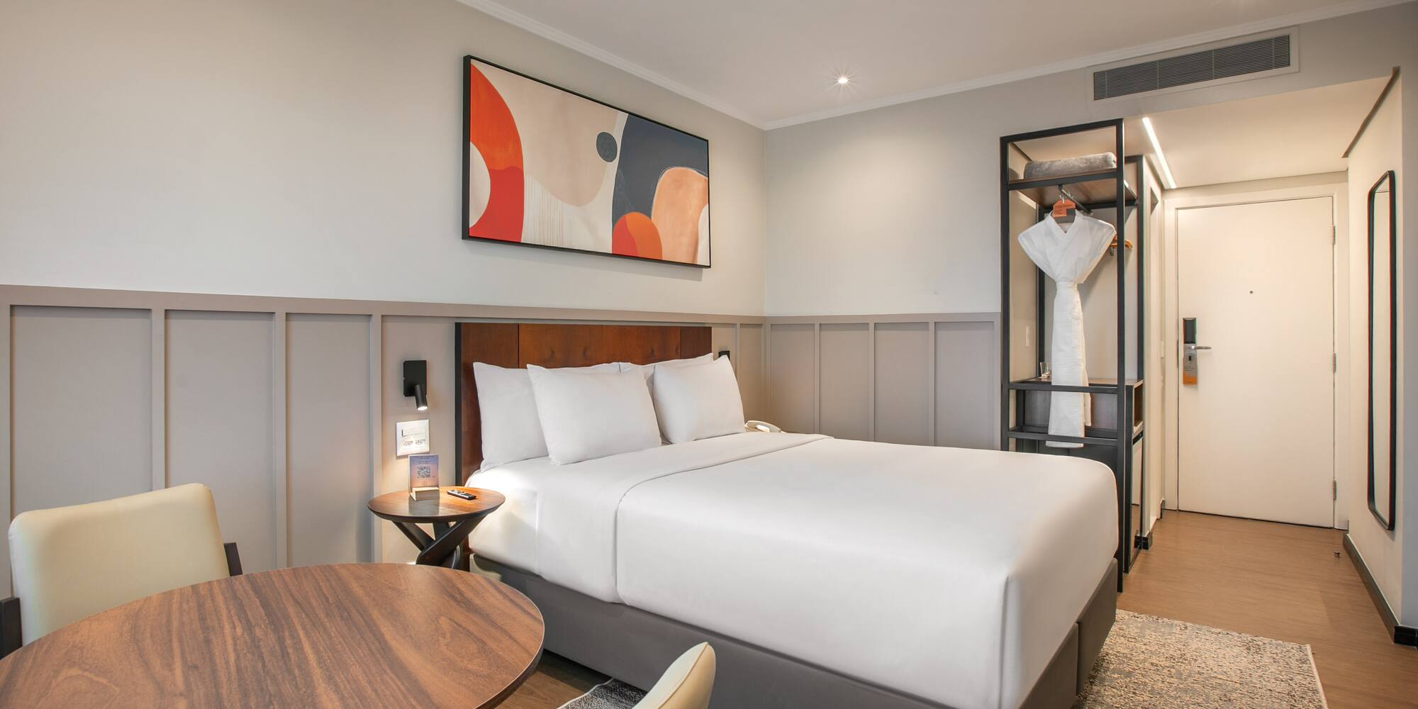 a room with a bed and a table