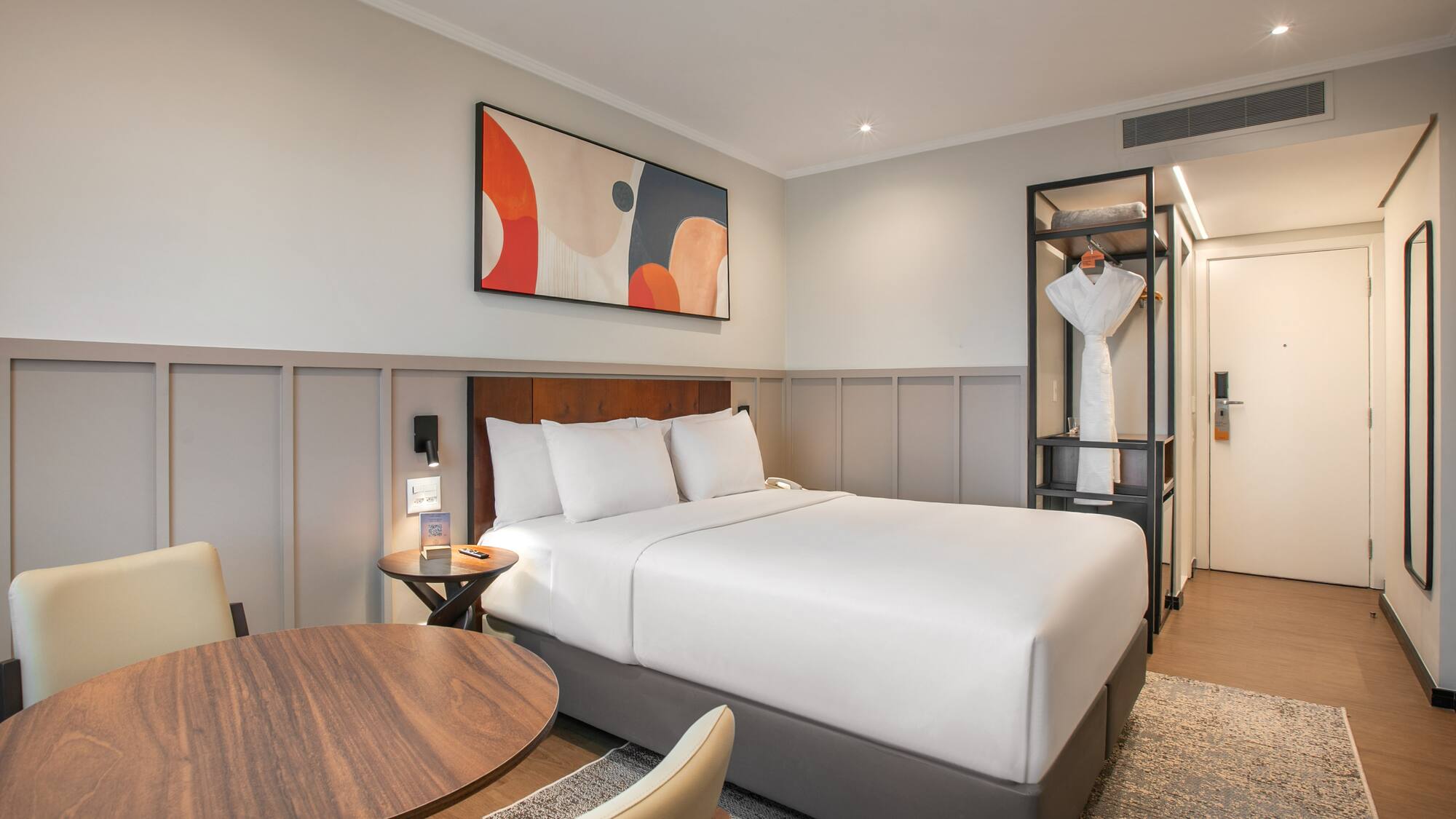 a room with a bed and a table