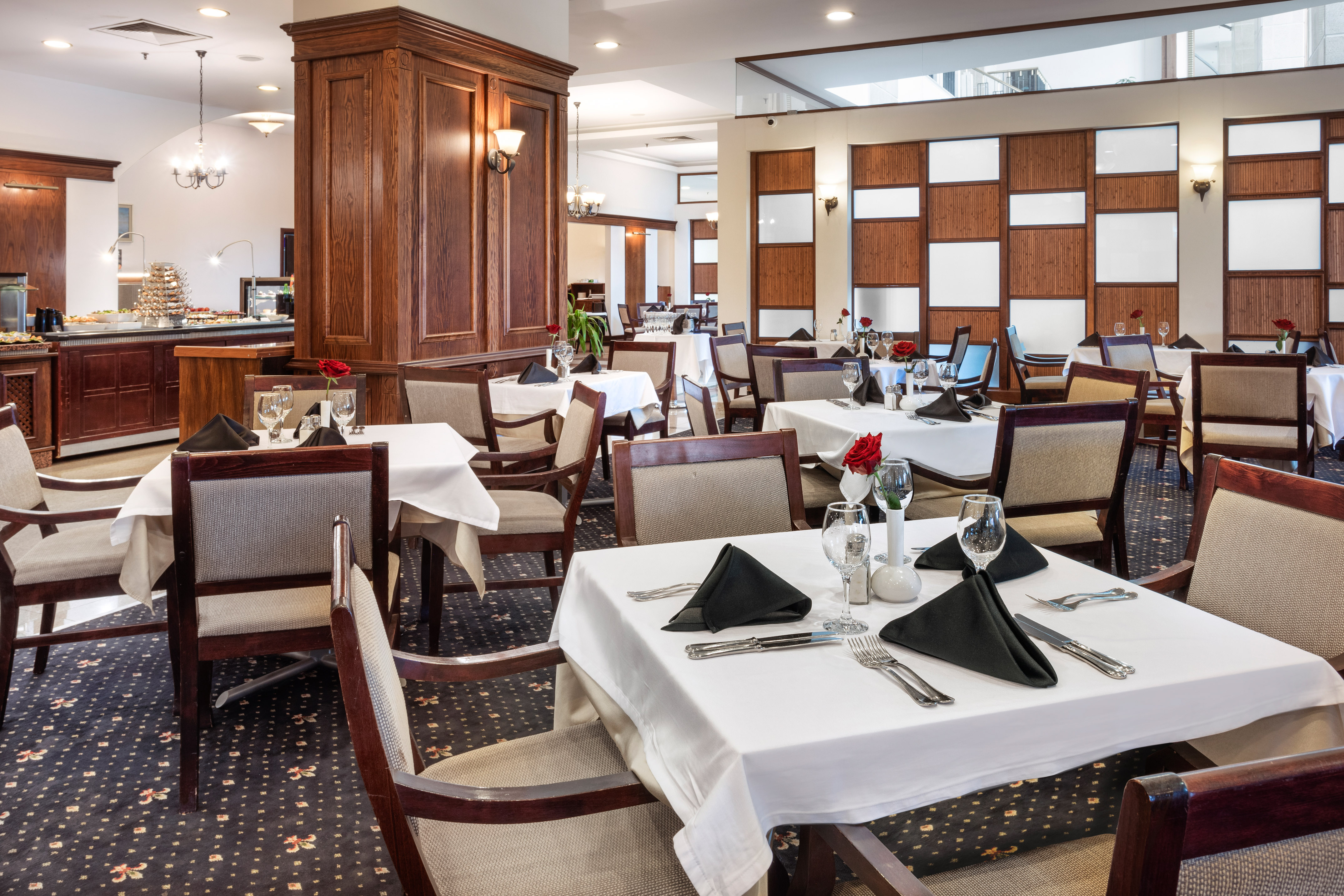 a restaurant with tables and chairs