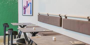 a table and chairs in a restaurant