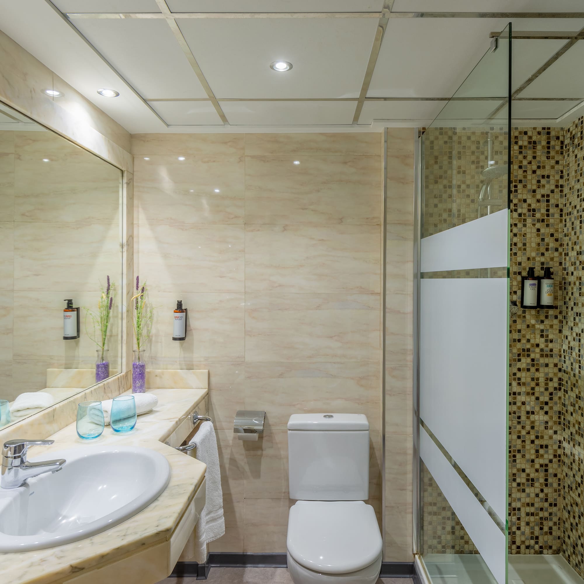 a bathroom with a shower and sink