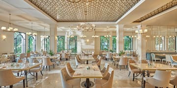 a room with tables and chairs