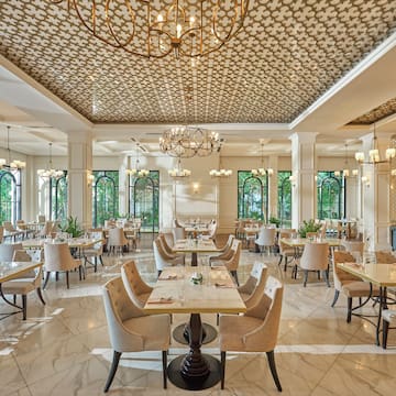 a room with tables and chairs