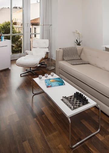 a living room with a couch and a table