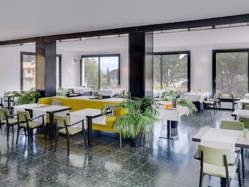 a room with tables and chairs