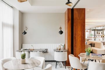 a room with tables and chairs