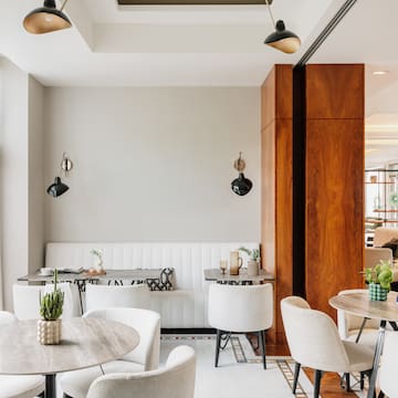 a room with tables and chairs