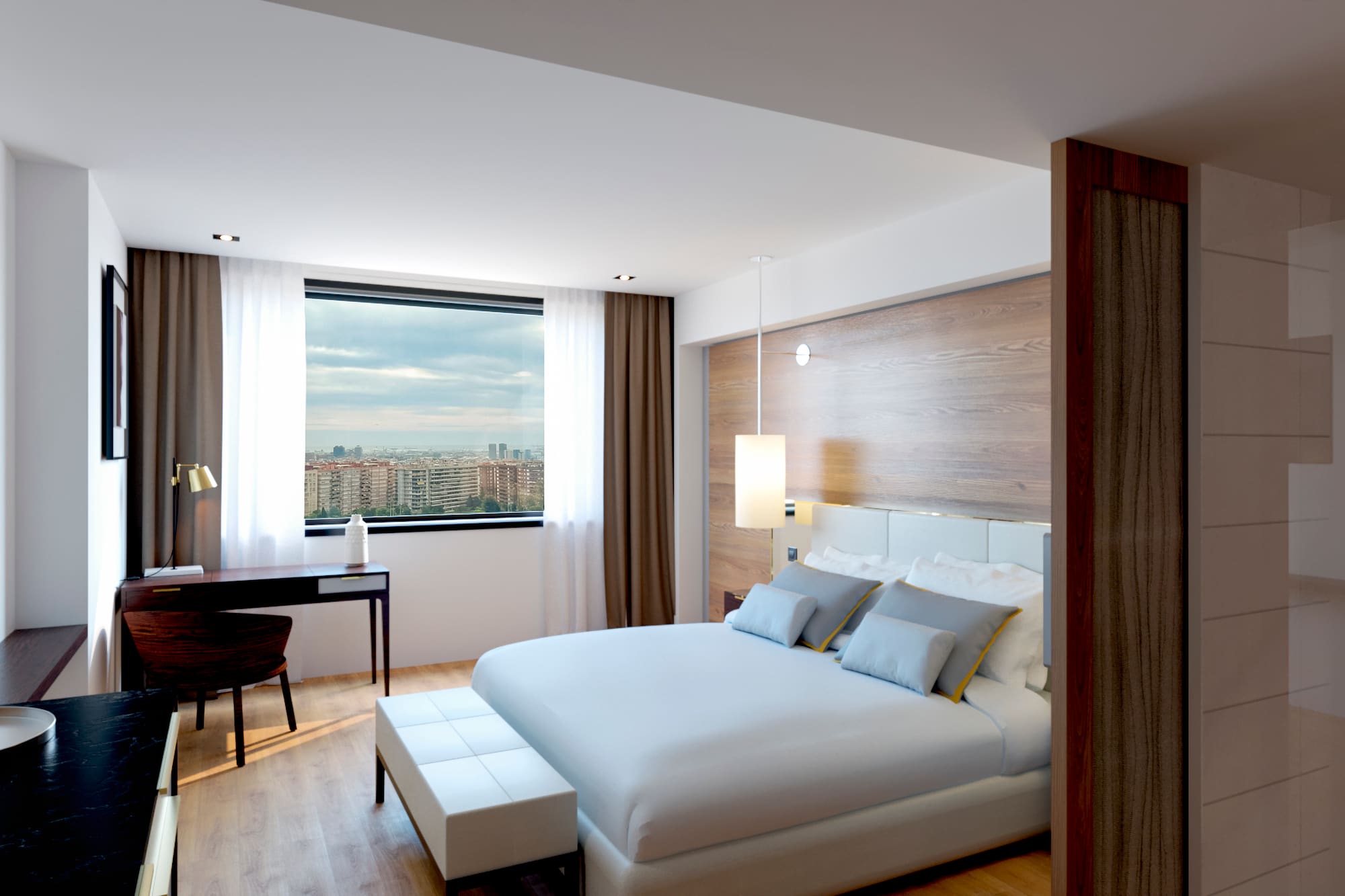 a bedroom with a desk and a bed