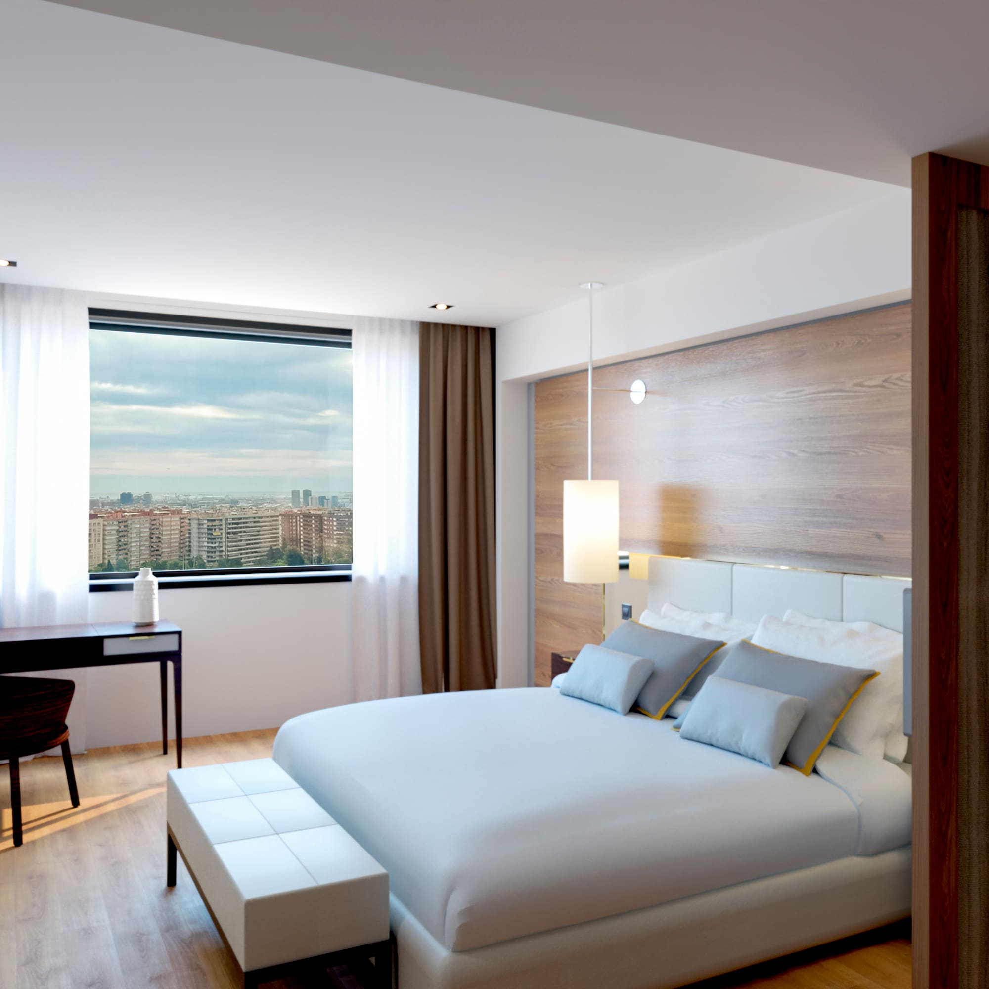 a bedroom with a desk and a bed