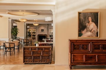 a room with a painting on the wall