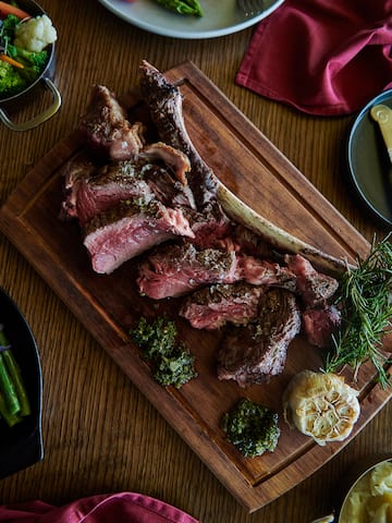 a cut up meat on a cutting board