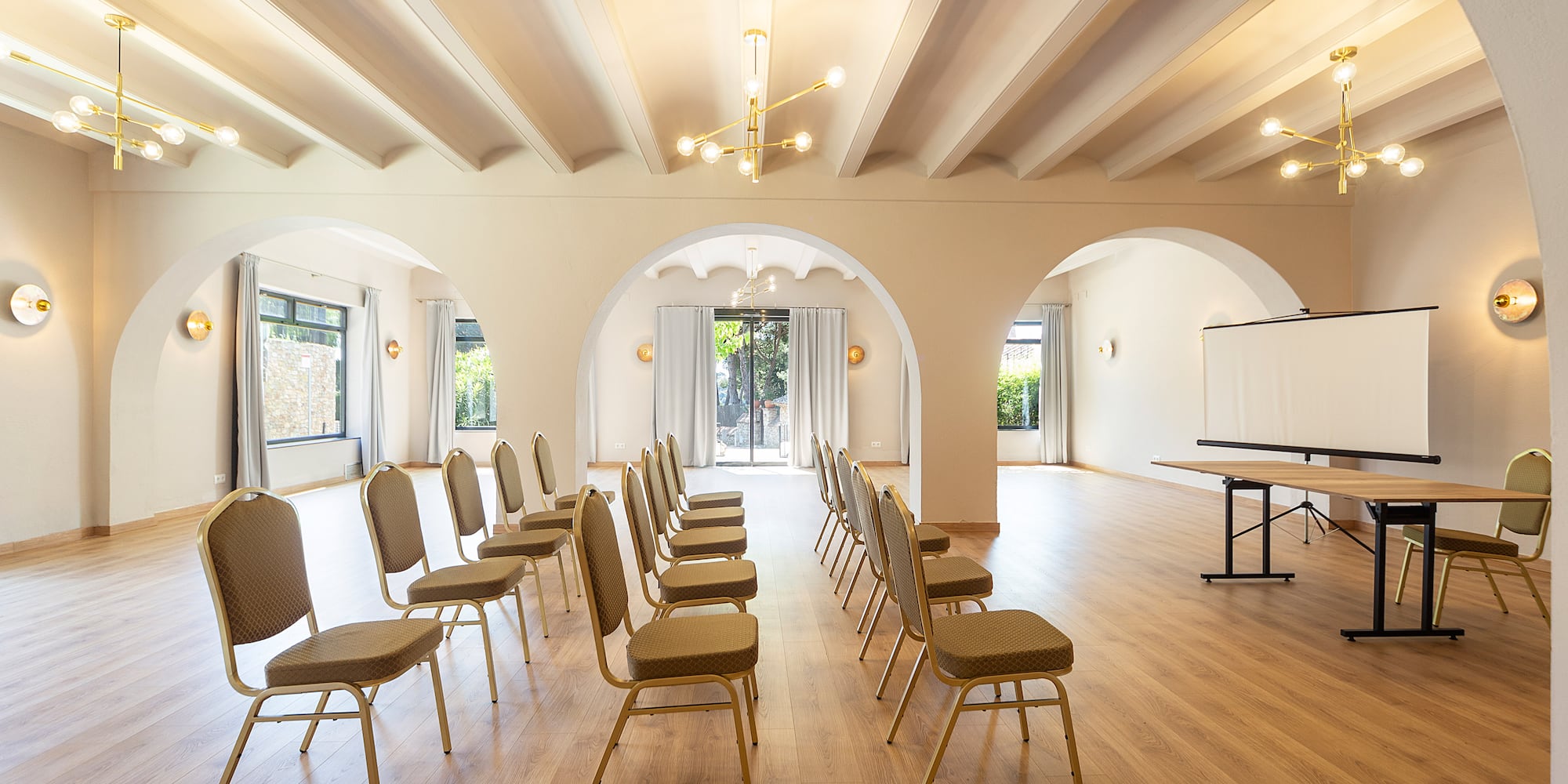 a room with chairs and a stage