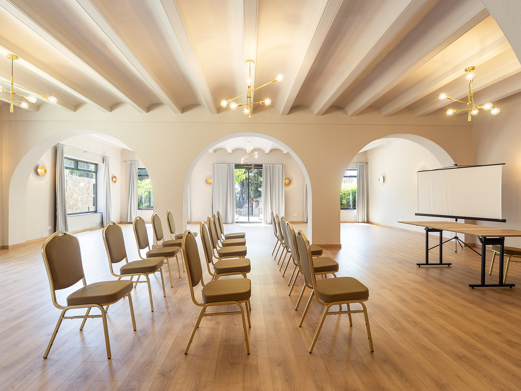 a room with chairs and a stage