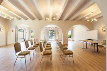 a room with chairs and a stage