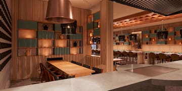 a room with a table and chairs