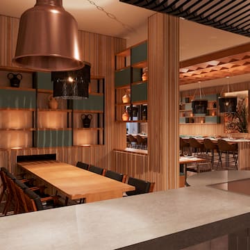 a room with a table and chairs